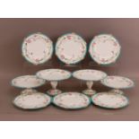 A late 19th century Staffordshire porcelain set of dessert plates and stands, comprising six plates,