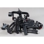 A DJI Ronin-M Stabilized Gimbal System, comprising a Ronin-M gimbal, stand, hand grips, an RM-TX1