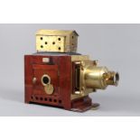 An early 20th Century Mahogany and Brass Newton and Co Magic Lantern, in wooden case, with