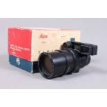 A Leitz Canada Elmarit 135mm F/2.8 Lens, serial no 2997476, 1979, black, magnifier spectacles,