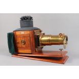 A late 19th Century Mahogany and Brass Newton and Co Magic Lantern, engraved to front 'Newton &