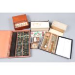 A Collection of late 19th Century Microscope Slides, paper-covered, small size (apx. 40), regular