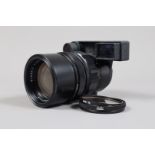 A Leitz Canada Elmarit 135mm F/2.8 Lens, serial no 2621248, 1973, black, magnifier spectacles,