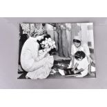 Gelatin silver print press photographs of the British Royal Family, most stamped and with typed