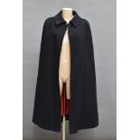 A War Period Red Cross cape, the dark blue cape with red liner, with two long red ties, no size of