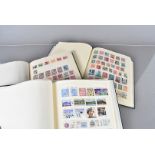 British and World stamps, six albums containing British, Commonwealth and World stamps, early and