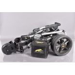 Golf, a battery operated Powakaddy golf trolley, battery untested