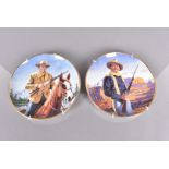 A collection of twelve John Wayne collectors plates, all with different designs (12)