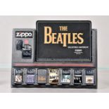 The Beatles, a collection of eight Beatles Zippo Lighters, mainly dated 1998, comprising five with