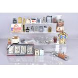 An assortment of table and pocket lighters, including sets and various novelty lighters, AF (parcel)