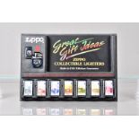 Zippo Euro Bank Note display set, the plastic display containing seven 1999 dated Zippo lighters