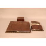 A group of c.1960's crocodile skin desk items, comprising a large hinged blotter (AF), 31cm x