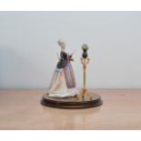 A limited edition Royal Doulton figurine from the Gentle Arts collection, Flower Arranging', HN