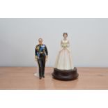 Two limited edition Royal Doulton figurines of Her Majesty Queen Elizabeth II and HRH the late