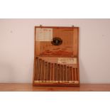A collection of Jose Florez cigars, of various sizes in a display wooden box, 10 cigars in total