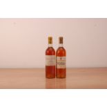 Two bottles of vintage 1986 'Sauternes' pudding wine, comprising one bottles of Chateau de Rollard