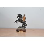 A limited edition Royal Doulton figurine of Dick Turpin, HN 3272, no. 492 of 5,000, on a wooden