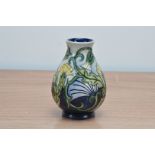 A seconds Moorcroft pottery baluster vase, Seathistle' pattern, 1998, 14cm high