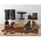 A large collection of wooden items, including a treen bowl, a pair of brush pots, a wooden cake