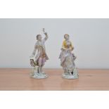 A pair of Sitzendorf porcelain figurines, male and female, a prancing man and a lady playing a