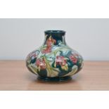 A seconds Moorcroft pottery squat vase, by Morris, 1995, 18cm high