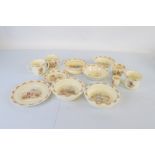 A small collection of Royal Doulton BunnyKins ware, including baby bowls, twin handled cups and