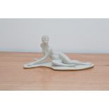 A pre 1950's Bisque Capo di Monte figurine of Venus, by G. Pellati, on a shaped gilt edged base,