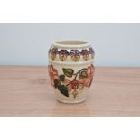 A Moorcroft pottery vase, Trial vase, 12.5cm high, in a retail box