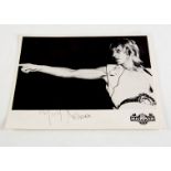 Mick Ronson / Signature, a promotional black and white photo of Mick Ronson with signature at the