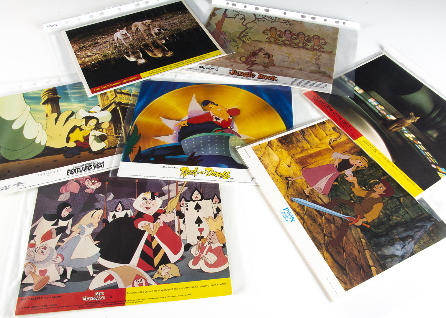 Disney Film Lobby Cards, seven complete sets of eight Disney lobby cards (10" x 8") comprising