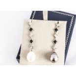 A pair of white metal, diamond, onyx and two coloured pearl ear drops, the lozenge shaped links
