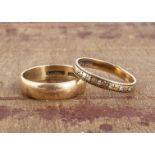 Two 9ct gold wedding bands, one set with small eight cut diamonds, the other D shaped, both ring