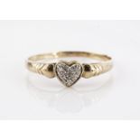 A 9ct gold diamond heart shaped dress ring, ring size Y, 1.6g