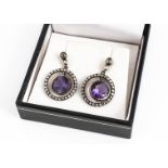 A pair of Antique style amethyst and diamond ear drops, the round cut amethysts, in silver fronted