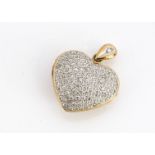 A contemporary yellow and white metal diamond encrusted heart shaped locket, with pierced back,