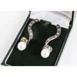 A pair of Antique style diamond and pearl earrings, the twist drops set with rose cut diamonds,