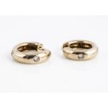 A pair of 9ct gold and gem set hoop/cuff earrings, marked 375 to inner, 1.3 cm diameter, 3.3g