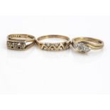 Three 9ct gold diamond rings, comprising an illusion set three stone cross over ring size L1/2,