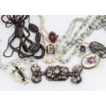 A collection of costume jewellery, including mother of pearl necklace, opalescent glass beads,