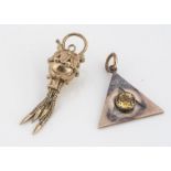 Two 9ct gold pendants, comprising a padlock with tassels, and a triangular with citrine centre,