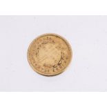 A mid 19th century American gold one dollar coin, dated 1851, F