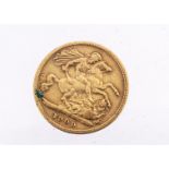 A Victorian gold half sovereign, dated 1900, worn-F