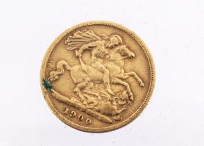 A Victorian gold half sovereign, dated 1900, worn-F