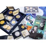 A collection of modern coins and medallions and other items, a box of modern crowns and similar