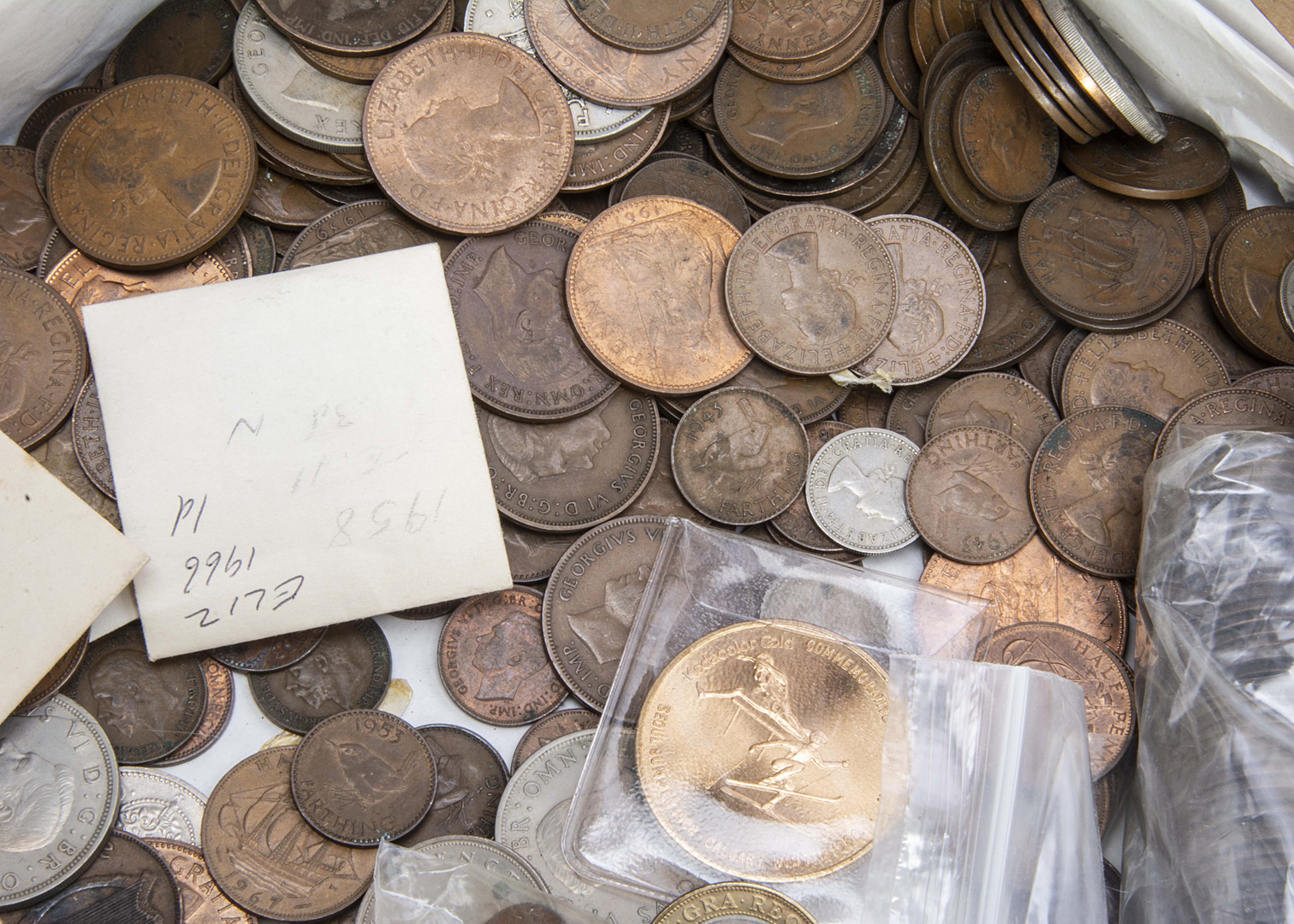 A box of British 20th century coins, also some earlier examples, mostly copper pennies and half