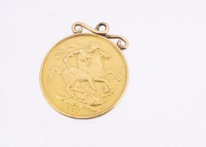 A Victorian gold double sovereign pendant, dated for 1887, with applied soldered bale loop and