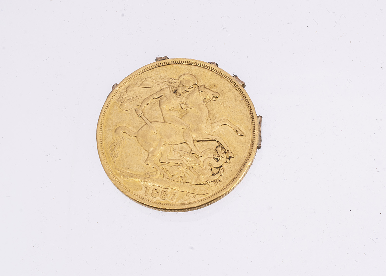 A formally mounted Victorian double sovereign style gold coin, the two pound style coin once - Image 2 of 2