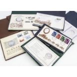 Six 1970s numismatic first day covers, each with silver coin or medallion and in plastic folder,