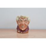 A Royal Doulton character jug of The Clown, with grey hair, marked to the base, 15.5cm H