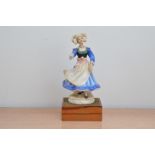 A limited edition Royal Doulton ceramic figurine if the Breton Dancer, from the Dancers of the World